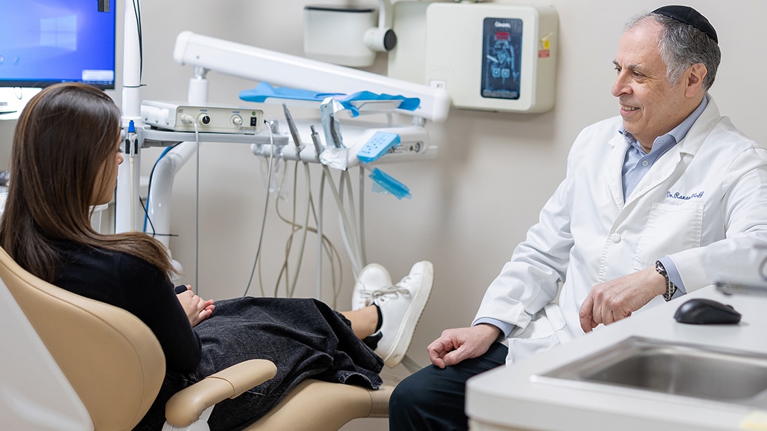 Dr. Hewlett Talking with Patient